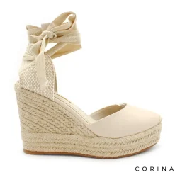 Alpargata beige atada con cuña alta