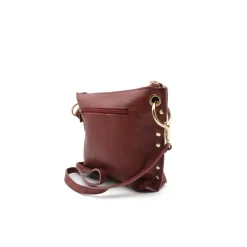 Bolso granate de piel con tachas