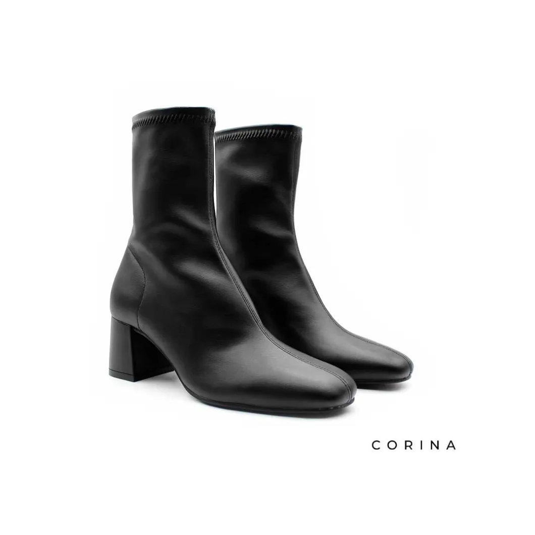 Botín ajustado negro con tacón ancho