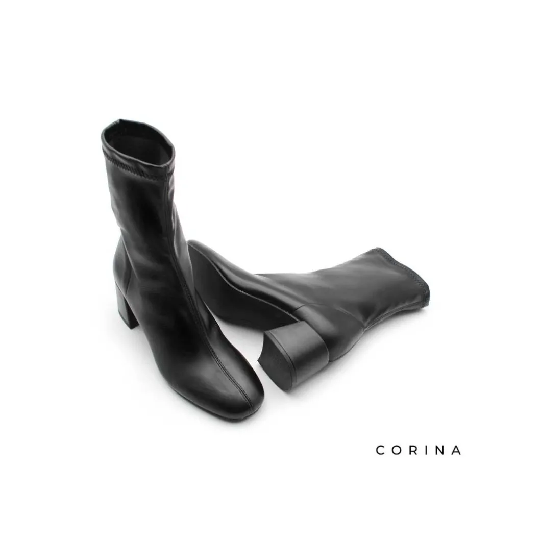 Botín ajustado negro con tacón ancho