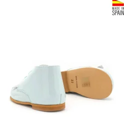 Botín charol azul lengüeta plata