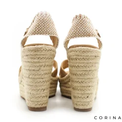 Sandalia beige con cuña alta de esparto