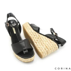 Sandalia negra con cuña alta de rafia