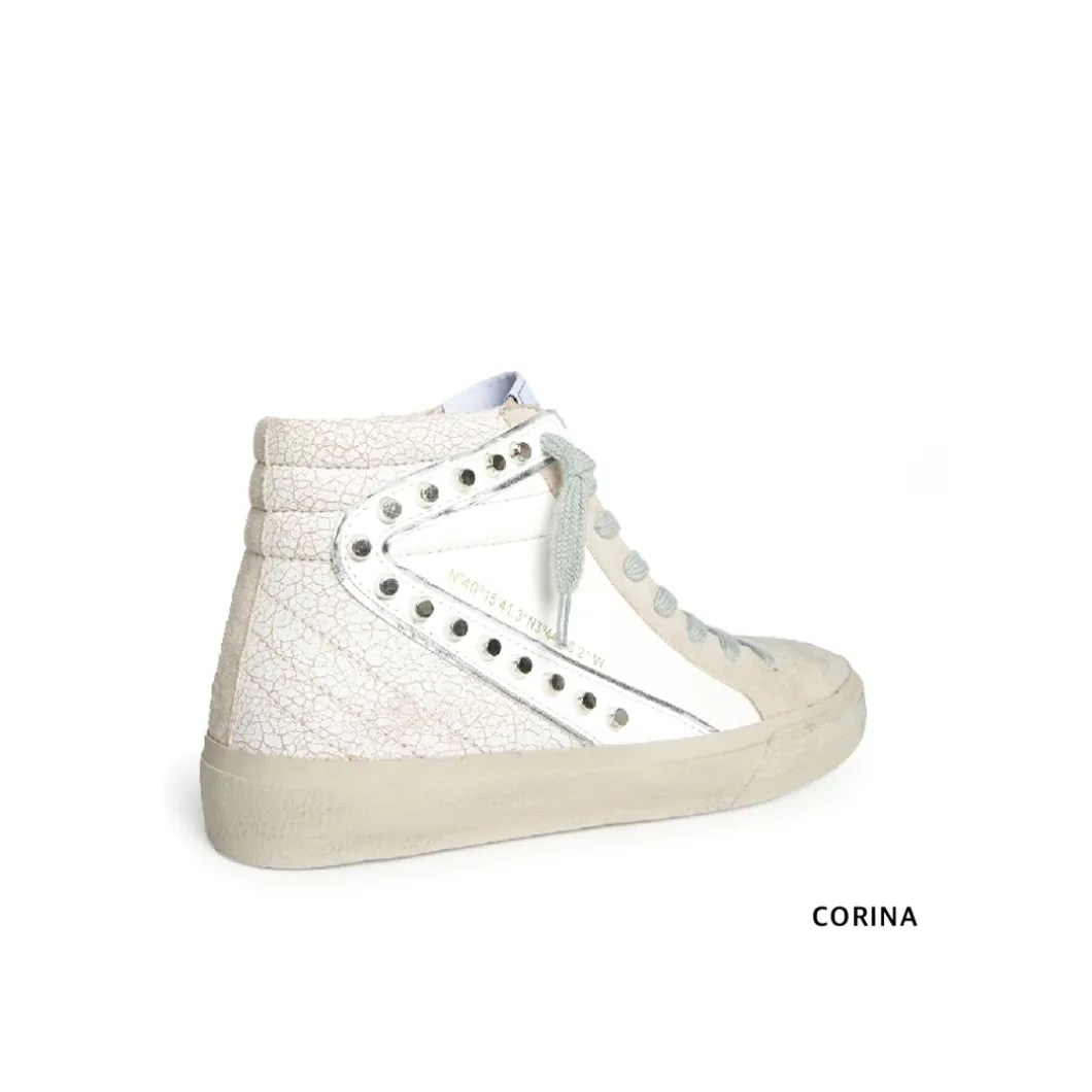 Zapatilla abotinada tachas blanca