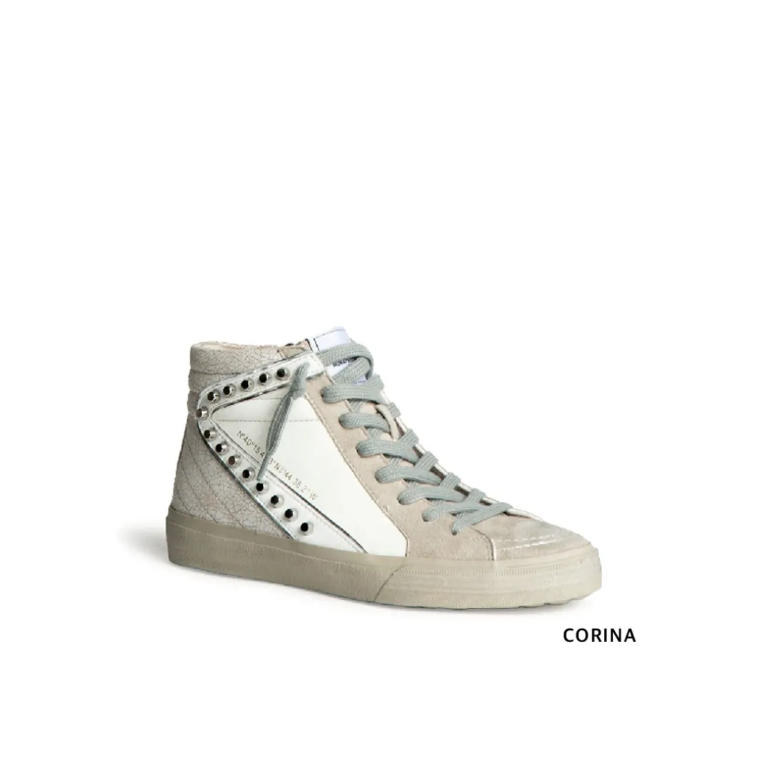Zapatilla abotinada tachas blanca