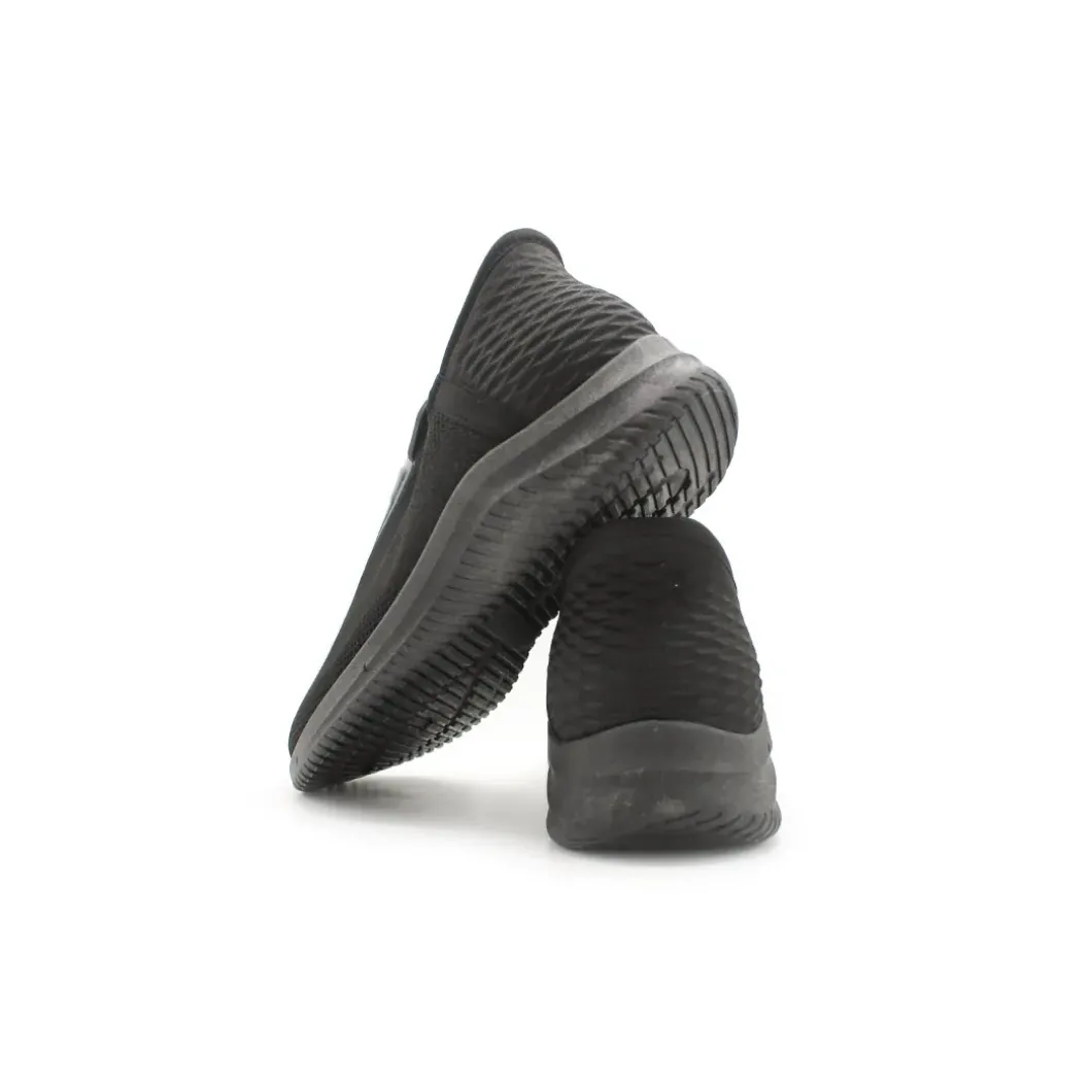 Zapatilla elástica slip on negro