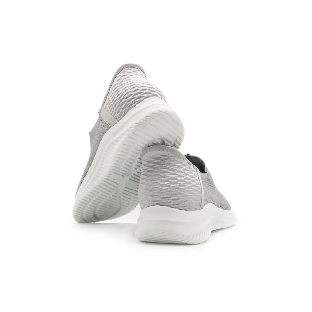 Zapatilla elástica slip on gris