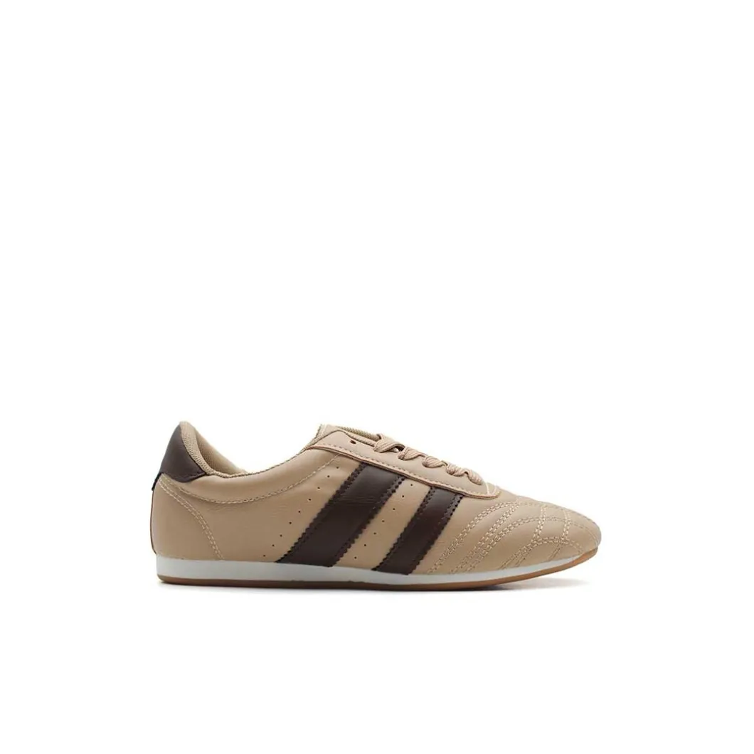 Zapatilla soccer beige