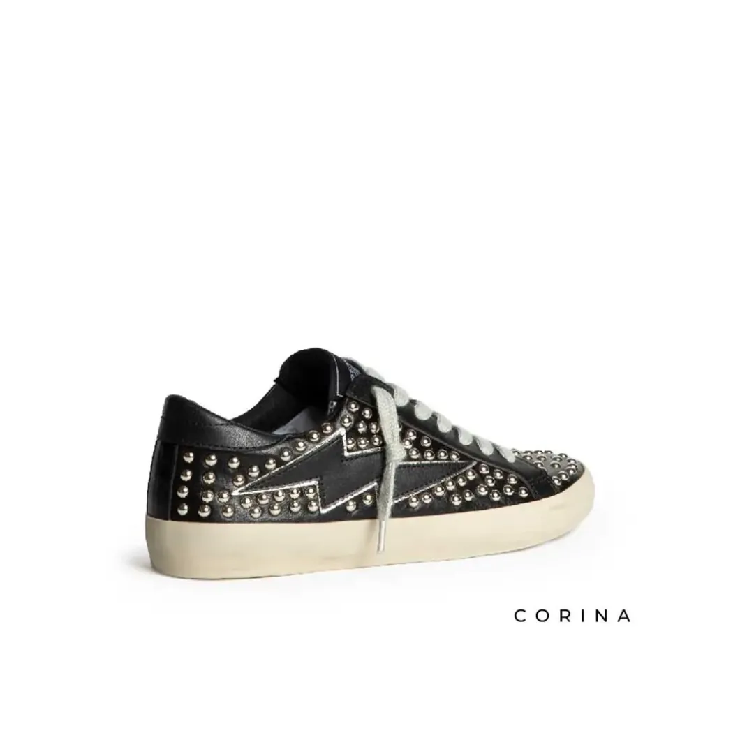 Zapatillas tachuelas efecto cuero negro