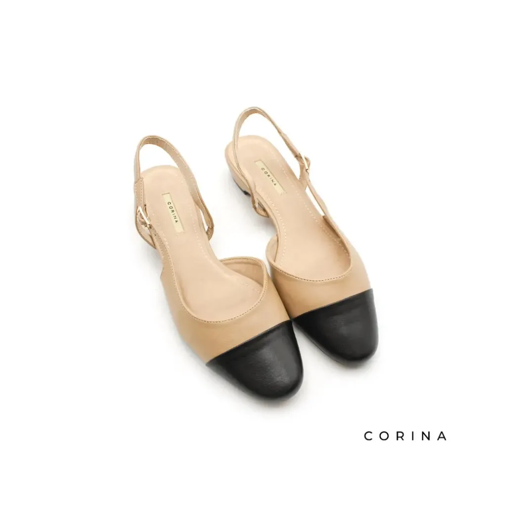 Zapato beige punta negra bajo